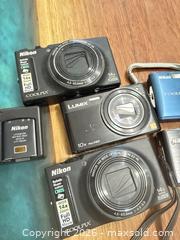 MaxSold Auction: Nikon camera lot  - Toronto (Ontario, Canada) SELLER MANAGED Downsizing Online Auction - Applefield Drive