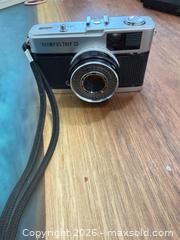 MaxSold Auction: Olympus Trip 35 Silver 40mm Point  Japan  - Toronto (Ontario, Canada) SELLER MANAGED Downsizing Online Auction - Applefield Drive