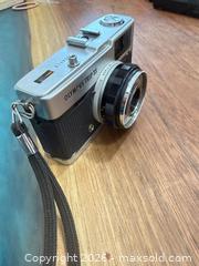 MaxSold Auction: Olympus Trip 35 Silver 40mm Point  Japan  - Toronto (Ontario, Canada) SELLER MANAGED Downsizing Online Auction - Applefield Drive