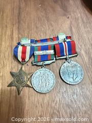 MaxSold Auction: three Canadian military medals awarded for service during the Second World War.  - Toronto (Ontario, Canada) SELLER MANAGED Downsizing Online Auction - Applefield Drive
