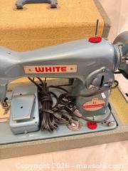 MaxSold Auction: Vintage Collectors White Japan Rotary Sewing Machine E-6354 Teal Retro Turquoise  - Toronto (Ontario, Canada) SELLER MANAGED Downsizing Online Auction - Applefield Drive