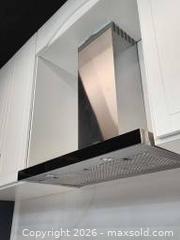 MaxSold Auction:  Brand New Elica Stainless Steel Range Hood - Mississauga (Ontario, Canada) PARTNER MANAGED Reseller Online Auction -  Dundas Street East