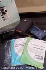 MaxSold Auction: Cannon Digital camera with battery charger - Ottawa (Ontario, Canada) SELLER MANAGED Downsizing Online Auction - Brennan Avenue