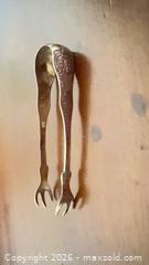 MaxSold Auction: Sterling tongs - Toronto (Ontario, Canada) Downsizing Online Auction - Rosedale Valley Road (CONDO)