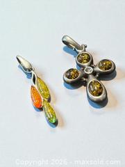 MaxSold Auction: Sterling Silver Amber Pendants 6.35g - Esquimalt (British Columbia, Canada) PARTNER MANAGED Estate Sale Online Auction - Lampson Street