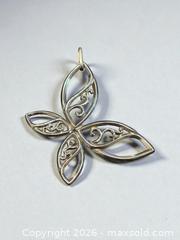 MaxSold Auction: Sterling Silver Butterfly Pendant 2.25" Width 12.71g - Esquimalt (British Columbia, Canada) PARTNER MANAGED Estate Sale Online Auction - Lampson Street