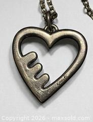 MaxSold Auction: Sterling Silver Coach Heart Necklace 36" Length 19.06g - Esquimalt (British Columbia, Canada) PARTNER MANAGED Estate Sale Online Auction - Lampson Street
