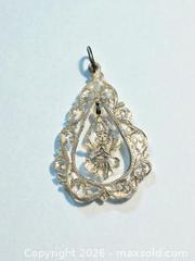 MaxSold Auction: Sterling Silver Goddess Mekkalah Pendant 1.5" 2.34g - Esquimalt (British Columbia, Canada) PARTNER MANAGED Estate Sale Online Auction - Lampson Street