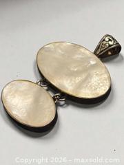 MaxSold Auction: Sterling Silver Mother of Pearl Pendant 2.25" Length 13.71g - Esquimalt (British Columbia, Canada) PARTNER MANAGED Estate Sale Online Auction - Lampson Street