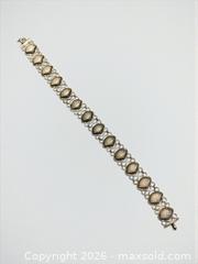 MaxSold Auction: Sterling Silver Seashell Bracelet 7.5" Length 7.38g - Esquimalt (British Columbia, Canada) PARTNER MANAGED Estate Sale Online Auction - Lampson Street