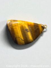 MaxSold Auction: Sterling Silver Shell Pendant and Tigers Eye Pendant 9.45g - Esquimalt (British Columbia, Canada) PARTNER MANAGED Estate Sale Online Auction - Lampson Street