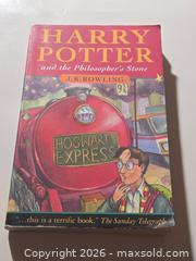 MaxSold Auction: Harry Potter and the Philosphers Stone First Ed. Paperback - Toronto (Ontario, Canada) PARTNER MANAGED Reseller Online Auction - Mcadam Avenue
