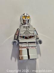 MaxSold Auction: LEGO Star Wars TC-14 Minifigure – Chrome Silver Promotional Droid (2012) - Toronto (Ontario, Canada) PARTNER MANAGED Reseller Online Auction - Mcadam Avenue