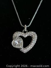 MaxSold Auction: Swarovski Double Hearts Necklace with Box - Toronto (Ontario, Canada) PARTNER MANAGED Reseller Online Auction - Mcadam Avenue