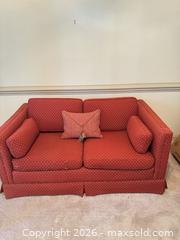 MaxSold Auction: Brick Red/Terracotta 2-Seater Loveseat with Bolster & Throw Pillow - Raleigh (North Carolina, USA) PARTNER MANAGED Downsizing Online Auction -  Tipping Circle