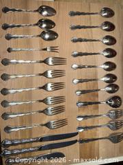 MaxSold Auction: Reed & Barton Sterling Silver Flatware Lot, Ornate Scalloped Handles 24-piece set  - Raleigh (North Carolina, USA) SELLER MANAGED Downsizing Online Auction -  Tipping Circle