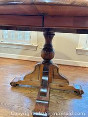 MaxSold Auction: Round Solid Pine Dining Table (~44")  - Raleigh (North Carolina, USA) SELLER MANAGED Downsizing Online Auction -  Tipping Circle