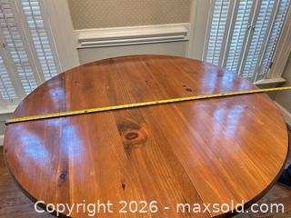 MaxSold Auction: Round Solid Pine Dining Table (~44")  - Raleigh (North Carolina, USA) SELLER MANAGED Downsizing Online Auction -  Tipping Circle