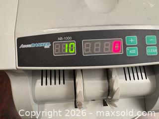 MaxSold Auction: Paper Money counter - Toronto (Ontario, Canada) SELLER MANAGED Reseller Online Auction - Kempsell Crescent