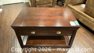 MaxSold Auction: Ashley Wood Lift-Top Coffee Table  - Grimsby (Ontario, Canada) PARTNER MANAGED Downsizing Online Auction - Dorchester Drive              