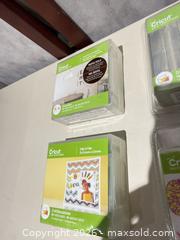 MaxSold Auction: Cricut Design/Cutting Cartridges Lot of 20 with Plastic Bin - Warwick (Rhode Island, USA) SELLER MANAGED Reseller Online Auction - Warwick Avenue
