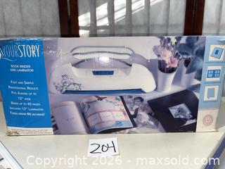 MaxSold Auction: YourStory Book Binder and Laminator, Fits up to 12" - Warwick (Rhode Island, USA) SELLER MANAGED Reseller Online Auction - Warwick Avenue