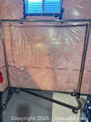 MaxSold Auction: Chrome Metal Garment Rack with Wheels, Heavy-Duty Base - Welland (Ontario, Canada) SELLER MANAGED Reseller Online Auction -  Stern Drive