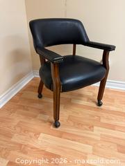 MaxSold Auction: Steve Silver Company Tournament Faux Leather Armchair with Casters # 2 - Markham (Ontario, Canada) SELLER MANAGED Moving Online Auction - Winter Creek Crescent