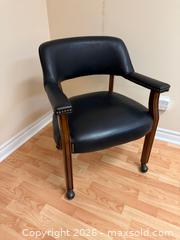 MaxSold Auction: Steve Silver Company Tournament Faux Leather Armchair with Casters # 2 - Markham (Ontario, Canada) SELLER MANAGED Moving Online Auction - Winter Creek Crescent