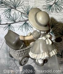 MaxSold Auction: Enesco Figurines 9 pieces - Lakeland (Florida, USA) SELLER MANAGED Downsizing Online Auction - West Socrum Loop Road