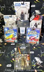 MaxSold Auction: Star Wars set of 6 keychains - Lakeland (Florida, USA) SELLER MANAGED Downsizing Online Auction - West Socrum Loop Road