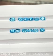 MaxSold Auction: 12 GENUINE (4.03ctw) AAA OVAL-CUT BRILLIANT BLUE TOPAZ GEMSTONES - Toronto (Ontario, Canada) PARTNER MANAGED Downsizing Online Auction - Queen Street East