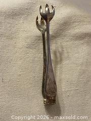 MaxSold Auction: Antique Birks Sterling Silver Sugar Tongs, About 4 in - Toronto (Ontario, Canada) SELLER MANAGED Downsizing Online Auction - O'connor Drive (CONDO)