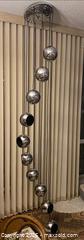 MaxSold Auction: RARE Mid Century Modern Italy 1970s Meblo Guzzini / Chrome Ten Ball Spiral Cascade Swag Chandelier / Space Age Design / Atomic Style - Toronto (Ontario, Canada) SELLER MANAGED Downsizing Online Auction - O'connor Drive (CONDO)
