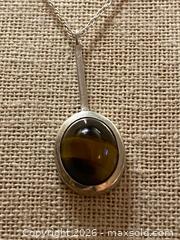MaxSold Auction: Sterling Silver MCM Tiger's Eye Pendant Necklace with Chain - 18 Inches Length - Toronto (Ontario, Canada) SELLER MANAGED Downsizing Online Auction - O'connor Drive (CONDO)