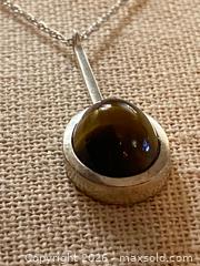 MaxSold Auction: Sterling Silver MCM Tiger's Eye Pendant Necklace with Chain - 18 Inches Length - Toronto (Ontario, Canada) SELLER MANAGED Downsizing Online Auction - O'connor Drive (CONDO)