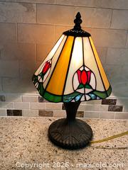 MaxSold Auction: Tiffany-style Stained Glass with Tulip Design Table Lamp with Metal Base - 13x7x6 - Toronto (Ontario, Canada) SELLER MANAGED Downsizing Online Auction - O'connor Drive (CONDO)