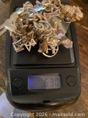 MaxSold Auction: Vintage 70s Sterling Silver Charm Bracelet with 28 Charms, 63g - Toronto (Ontario, Canada) SELLER MANAGED Downsizing Online Auction - O'connor Drive (CONDO)