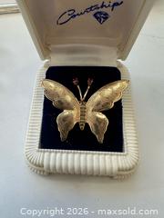 MaxSold Auction: 10kt gold marked butterfly brooch with ruby eyes.  - Oshawa (Ontario, Canada) SELLER MANAGED Estate Sale Online Auction -  Maddock