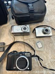 MaxSold Auction: Canon camera lot with carrying cases, 3 batteries, SD card - Oshawa (Ontario, Canada) SELLER MANAGED Estate Sale Online Auction -  Maddock