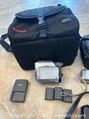 MaxSold Auction: Canon camera lot with carrying cases, 3 batteries, SD card - Oshawa (Ontario, Canada) SELLER MANAGED Estate Sale Online Auction -  Maddock