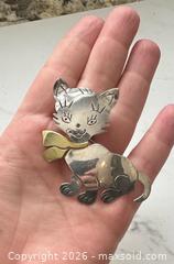 MaxSold Auction: Large sterling silver cat brooch - Oshawa (Ontario, Canada) SELLER MANAGED Estate Sale Online Auction -  Maddock