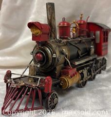 MaxSold Auction: Metal Train Engine Collectible - Idaho Springs (Colorado, USA) PARTNER MANAGED Estate Sale Online Auction - Idaho Street