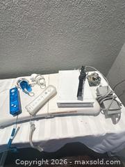 MaxSold Auction: Nintendo Wii (original) Console + Accessories Bundle & 8 Wii games  - Oklahoma City (Oklahoma, USA) SELLER MANAGED Downsizing Online Auction - Skylark Court