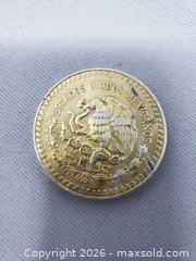 MaxSold Auction: 1 Oz. Mexican Silver Coin - 0.999 Purity - Toronto (Ontario, Canada) SELLER MANAGED Estate Sale Online Auction - Swanwick Avenue