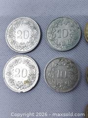 MaxSold Auction: Seven Helvetica Coins from Switzerland - Toronto (Ontario, Canada) SELLER MANAGED Estate Sale Online Auction - Swanwick Avenue