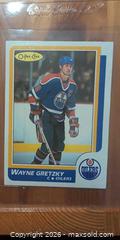 MaxSold Auction: 1986 O-Pee-Chee Wayne Gretzky #3, Edmonton Oilers - Ottawa (Ontario, Canada) SELLER MANAGED Downsizing Online Auction - Regiment Avenue