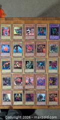 MaxSold Auction: 25 Yu-Gi-Oh! Trading Cards — Mixed Rarities - Ottawa (Ontario, Canada) SELLER MANAGED Downsizing Online Auction - Regiment Avenue