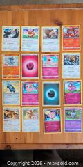MaxSold Auction: 48 Pokémon Trading Cards — Mixed Sets, Various Rarities - Ottawa (Ontario, Canada) SELLER MANAGED Downsizing Online Auction - Regiment Avenue
