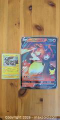 MaxSold Auction: Pokémon TCG Jumbo Lance's Charizard V Promo & Zekrom Holographic - Ottawa (Ontario, Canada) SELLER MANAGED Downsizing Online Auction - Regiment Avenue